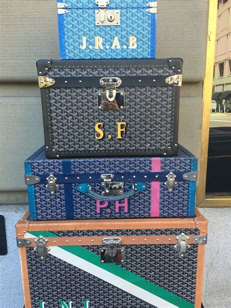 maleta goyard|Goyard trunk.